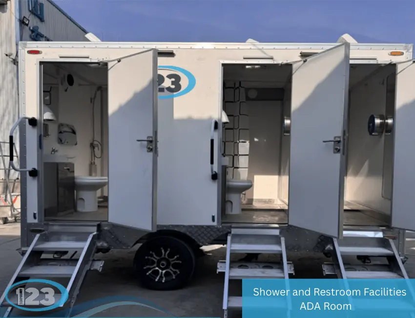 Exterior view of mobile shower and restroom trailer with multiple stalls, open doors, steps, and accessible entry